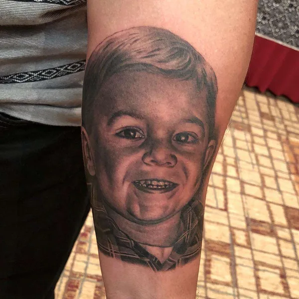 Portrait tattoo by Bob Tyrrell
