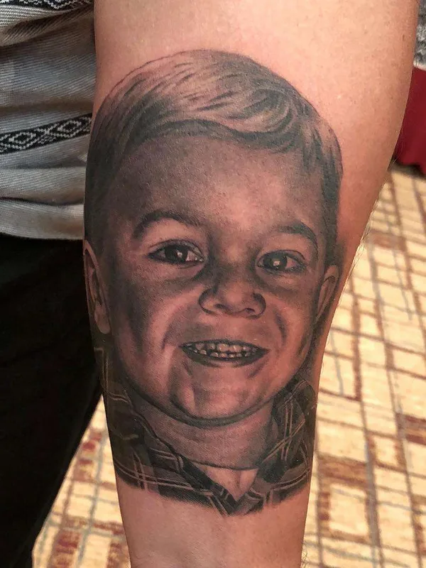 Portrait tattoo by Bob Tyrrell