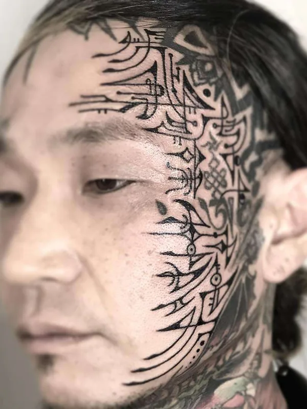 male black blackwork tatouage sur face #22173 | Artiste tatoueur Jondix