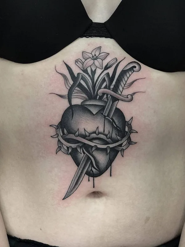 female black and grey black and grey tattoo on sternum #23582 | Tattoo Artist Javier Betancourt