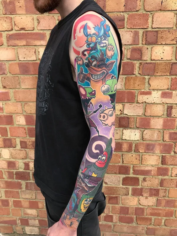 male color cartoon tattoo on full sleeve #24799 | Tattoo Artist Brent Goudie