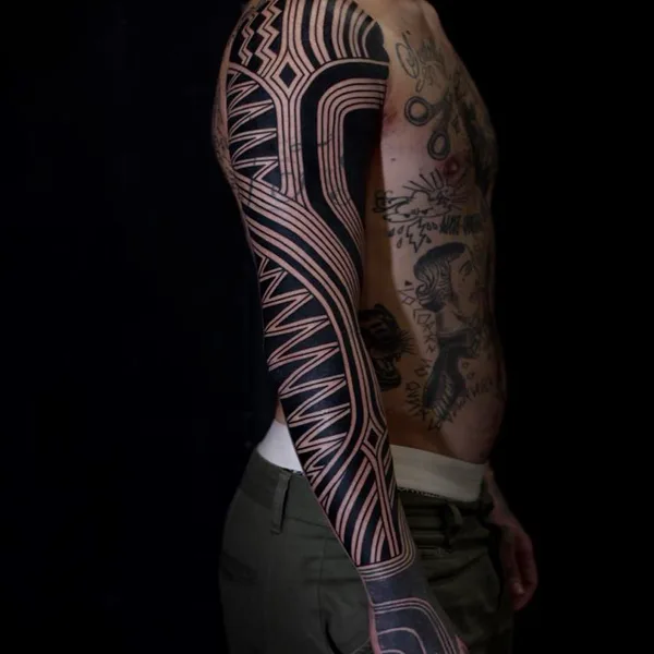 Graphic tattoo by Сharly Saconi in Buenos Aires