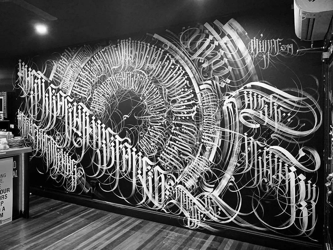 Tattoo artist MAYONAIZE, black lettering tattoo | Melbourne, Australia