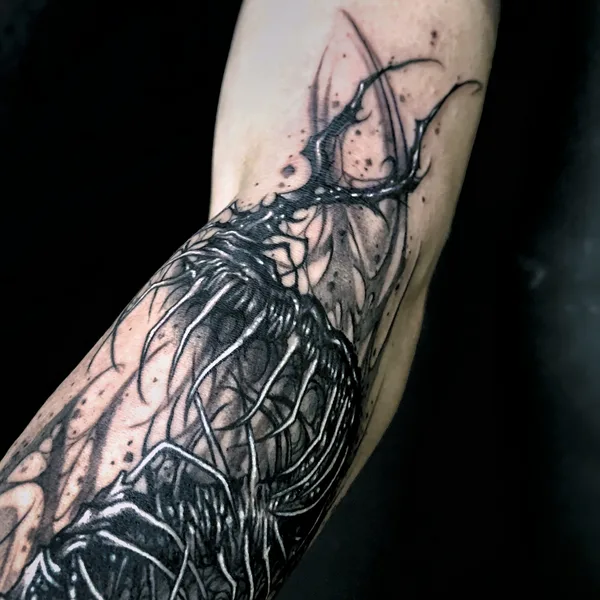 Ornamental tattoo by Andrey Pavlenko in Moscow