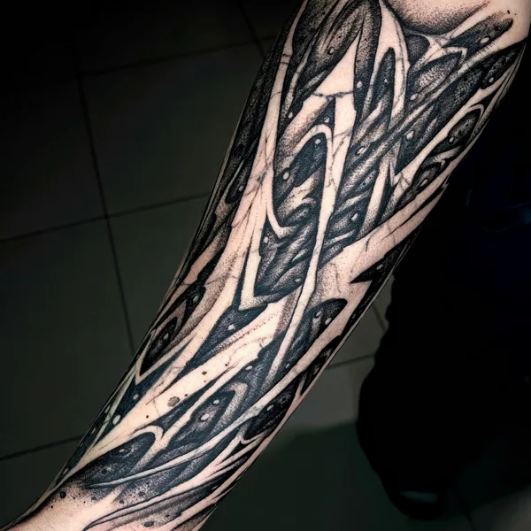 Ornamental tattoo by Andrey Pavlenko in Moscow