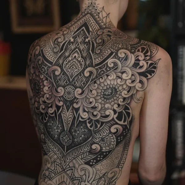Ornamental tattoo by Dino De Cesare in Sète