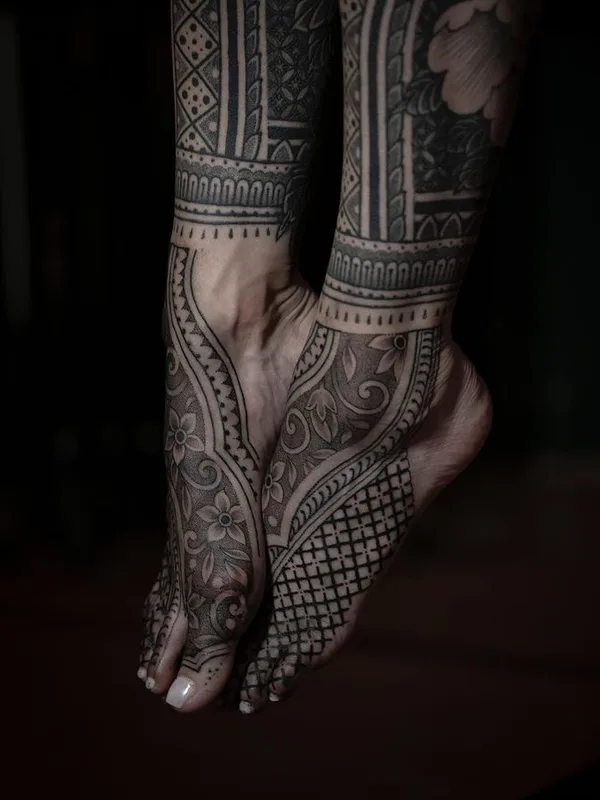 female black ornamental tattoo on foot #76212 | Tattoo Artist Dino De Cesare
