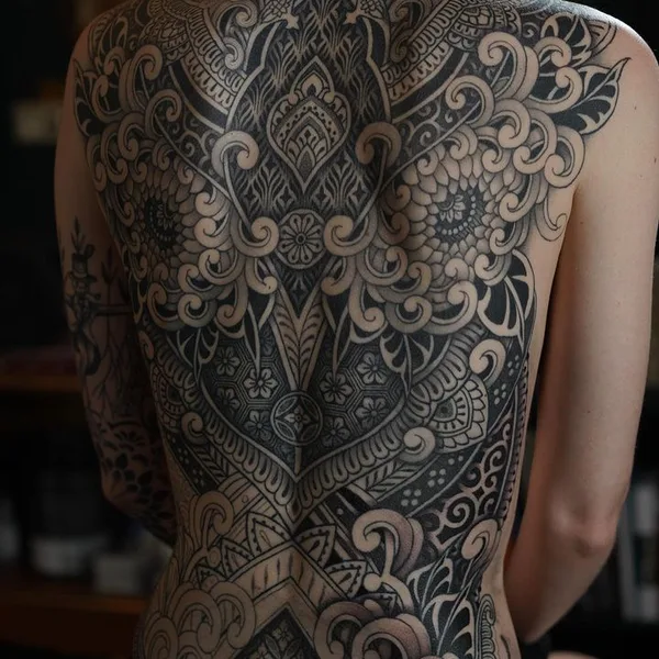 Ornamental tattoo by Dino De Cesare in Sète