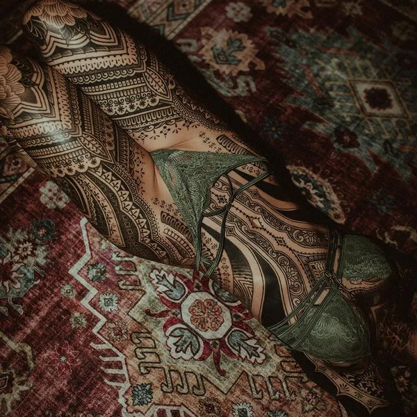 Ornamental tattoo by Dino De Cesare in Sète