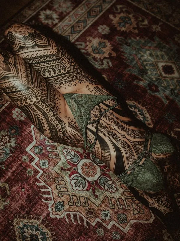 female black ornamental tattoo on full leg #76217 | Tattoo Artist Dino De Cesare