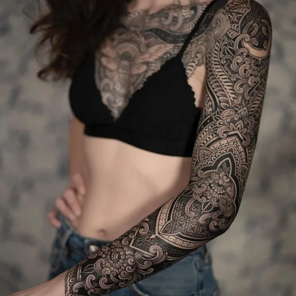 Ornamental tattoo by Dino De Cesare in Sète