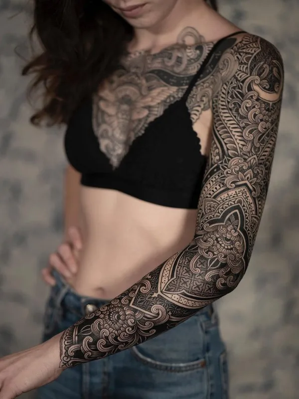 female black and grey ornamental tattoo on full sleeve #76218 | Tattoo Artist Dino De Cesare