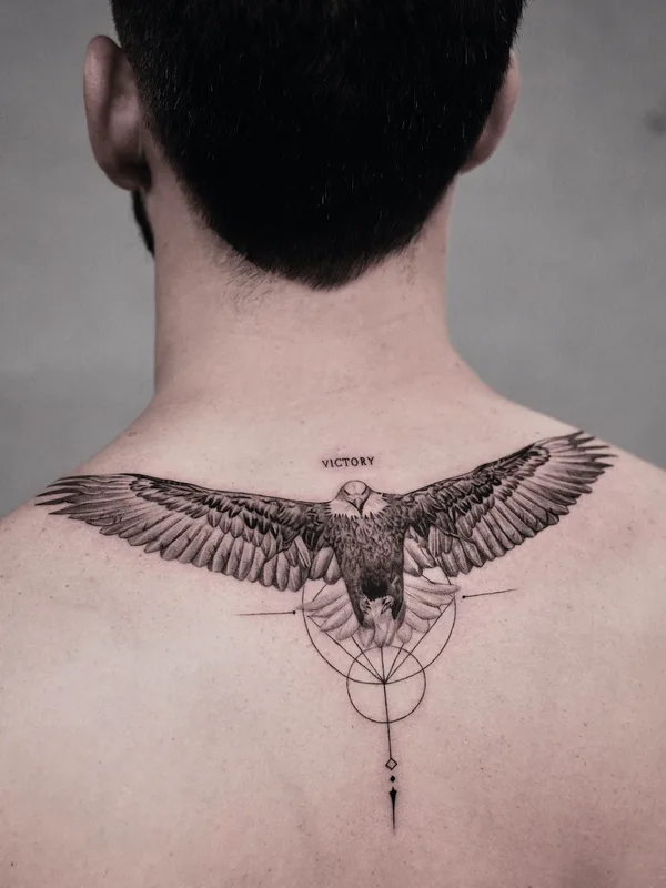 male black and grey black and grey tattoo on upper back #76458 | Tattoo Artist Kid Needle