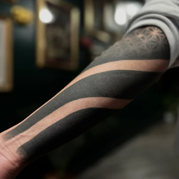 Ornamental tattoo by Fellipe Romeiro in São Paulo