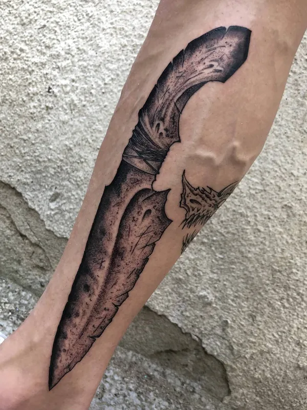 Graphic tattoo by George Pronin in Tbilisi