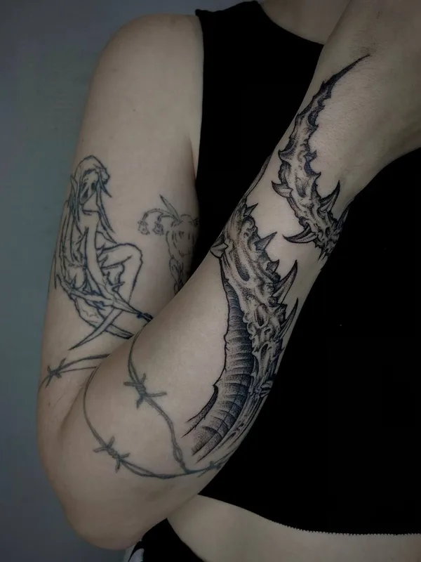 Graphic tattoo by George Pronin in Tbilisi