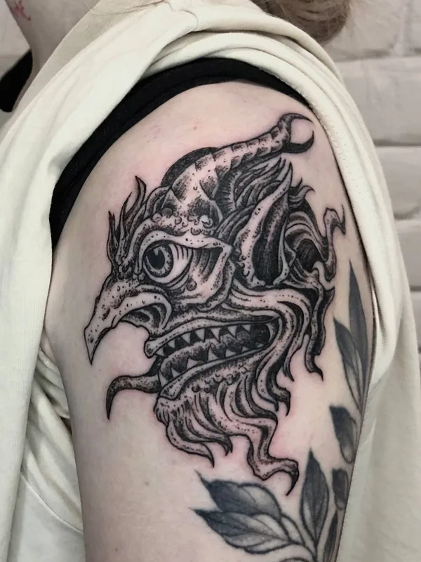 Graphic tattoo by George Pronin in Tbilisi