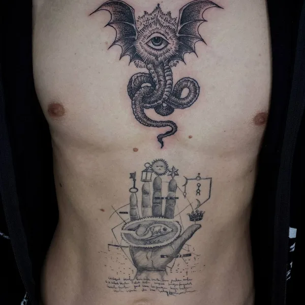 Graphic tattoo by George Pronin in Tbilisi