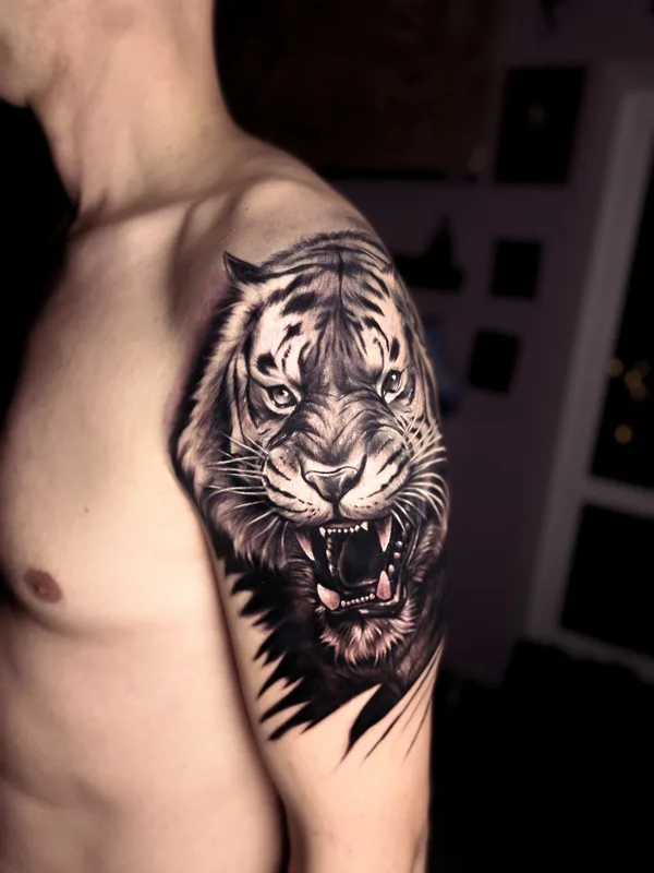 male black and grey realism tatouage sur upper arm #77844 | Artiste tatoueur Владислав Филимонов 
