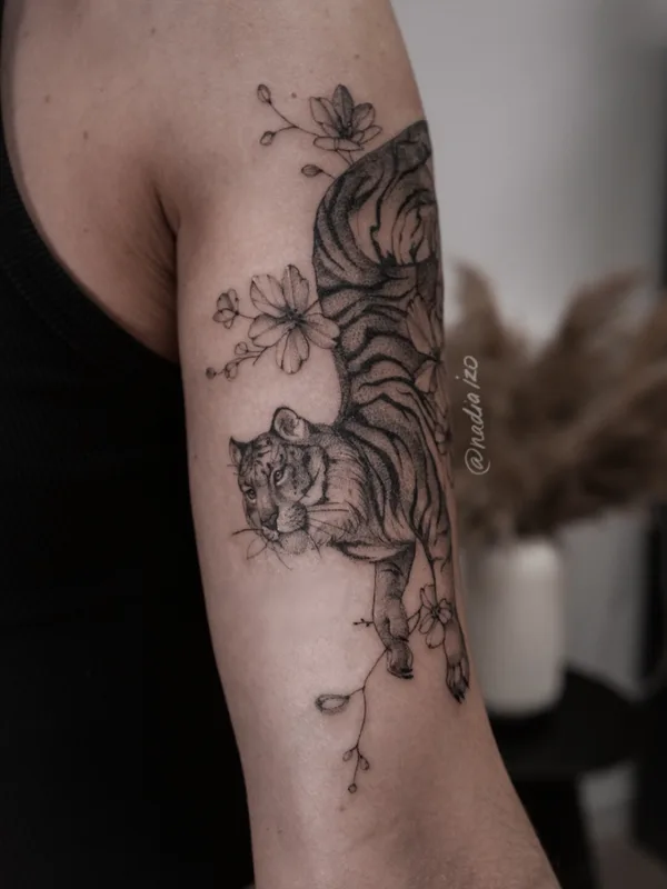 Botanical tattoo by Nadia Izo in Moscow