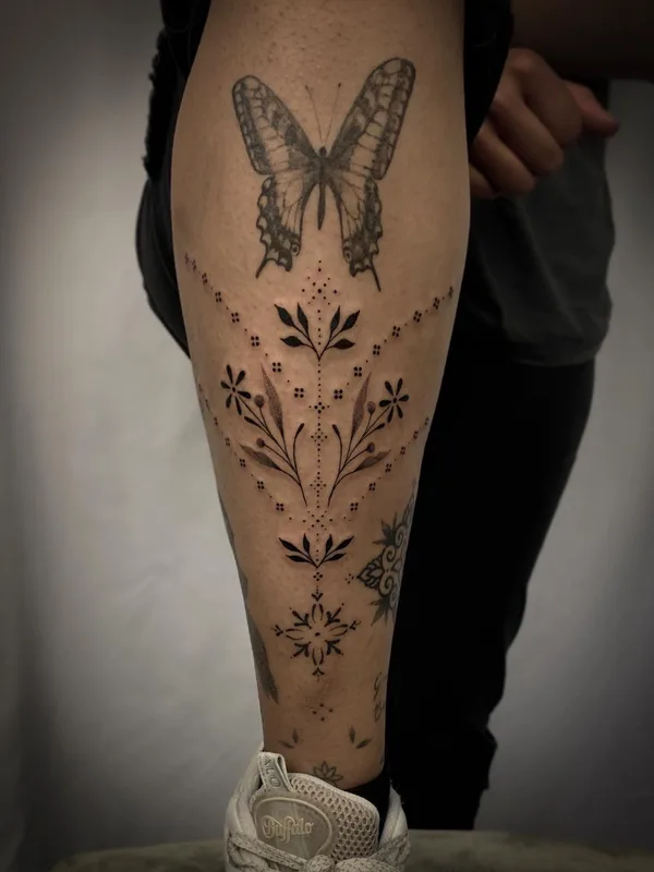 black and grey linework татуировка на calf #78153 | Тату мастер Emma More