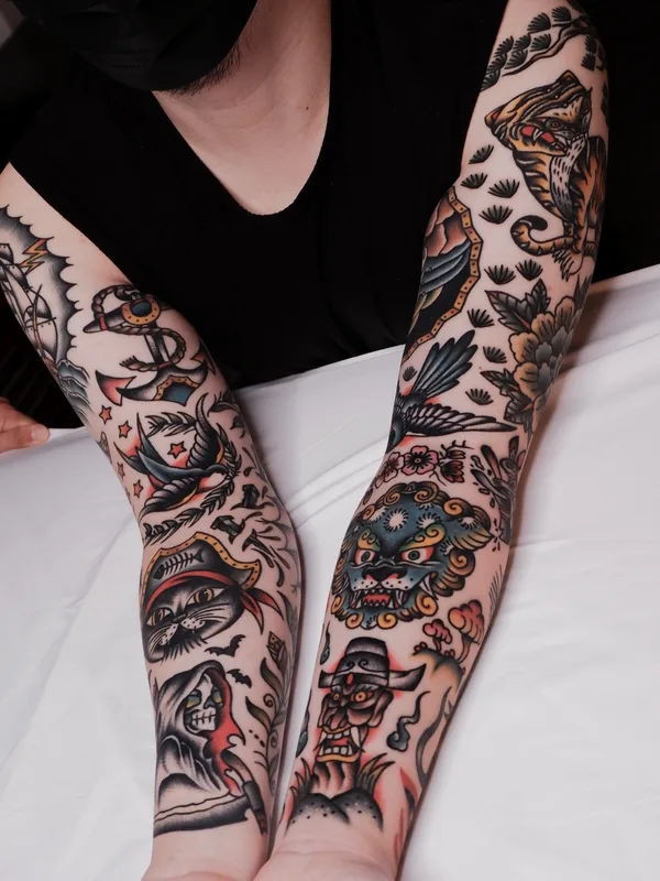 color traditional tattoo auf full sleeve #78265 | Tätowierer Ducky