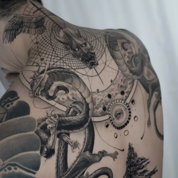 Graphic tattoo by Ogi Oh in Seoul