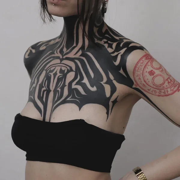 Black tattoo by Oscar Conejeros Pinto