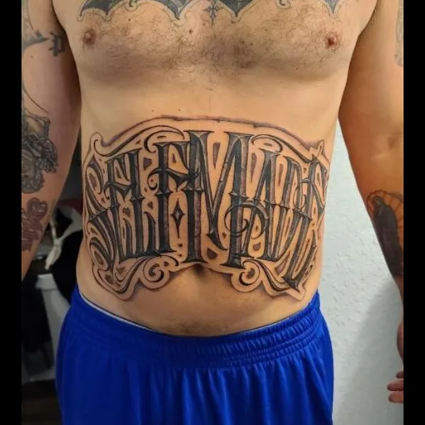Calligraphy tattoo by Jayden Beckman AKA: Ease  in Blaine