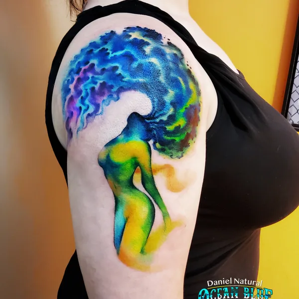 Watercolor tattoo by Daniel Natural in Minneapolis