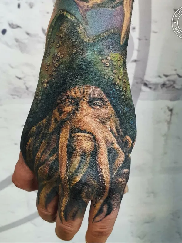 color realism tattoo on hand #82138 | Tattoo Artist Юрий Куйдунен 