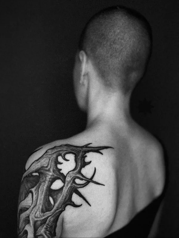 Biomechanical tattoo by Deni Aktemirov in Saint Petersburg