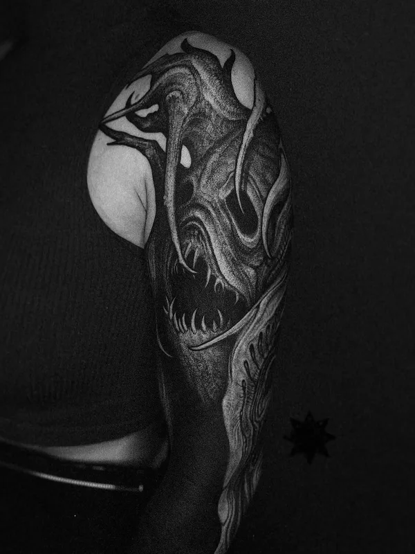 Biomechanical tattoo by Deni Aktemirov in Saint Petersburg