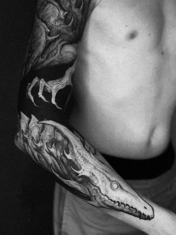 Biomechanical tattoo by Deni Aktemirov in Saint Petersburg
