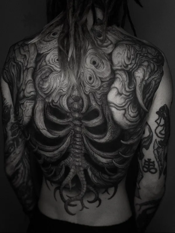 Biomechanical tattoo by Deni Aktemirov in Saint Petersburg