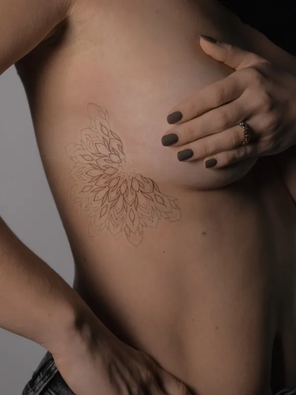 female black ornamental Tatuaggio su breast #83175 | Tatuatore Екатерина Максимова