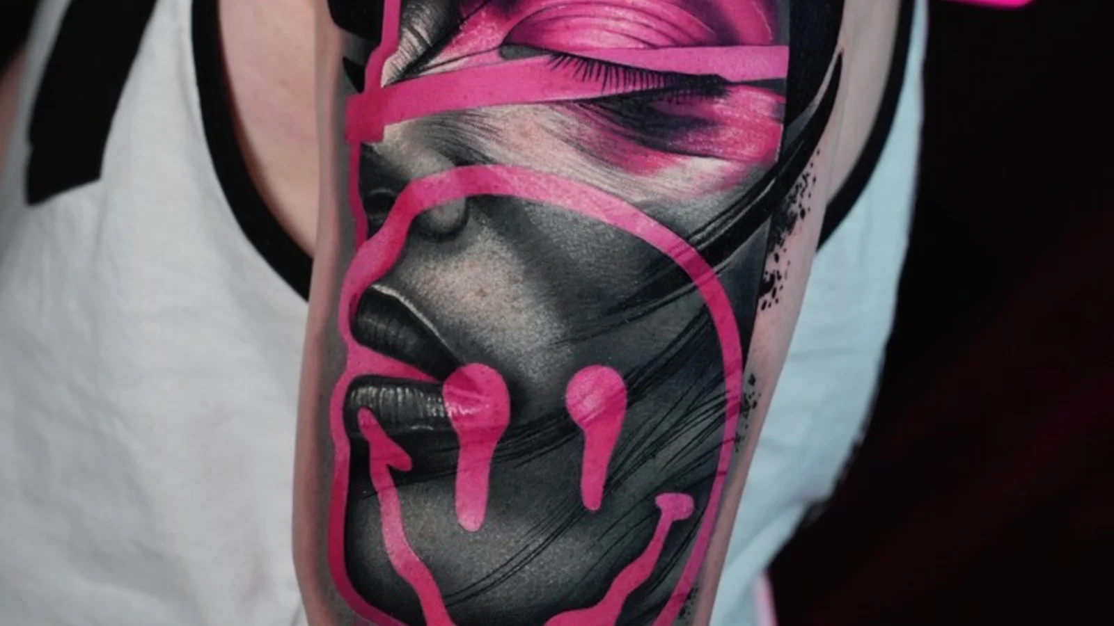 Neon pink in the black-and-grey world of Ruslan Millinhton's tattoos