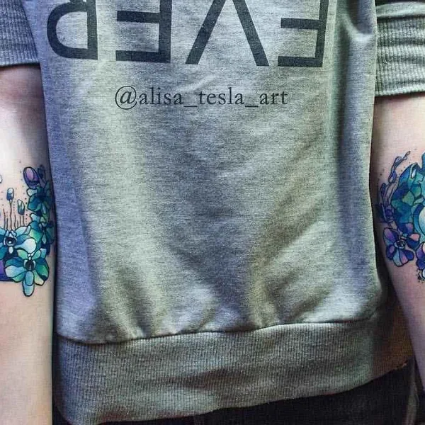Graphic tattoo by Alisa Tesla in Saint Petersburg