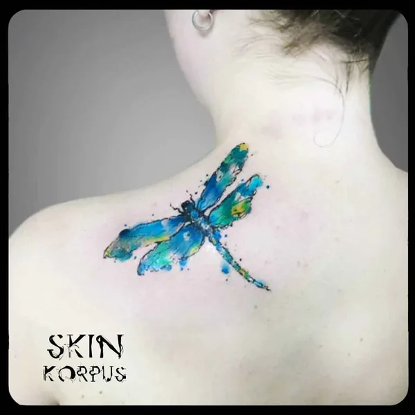 Watercolor tattoo by Skin Korpus in Luxembourg