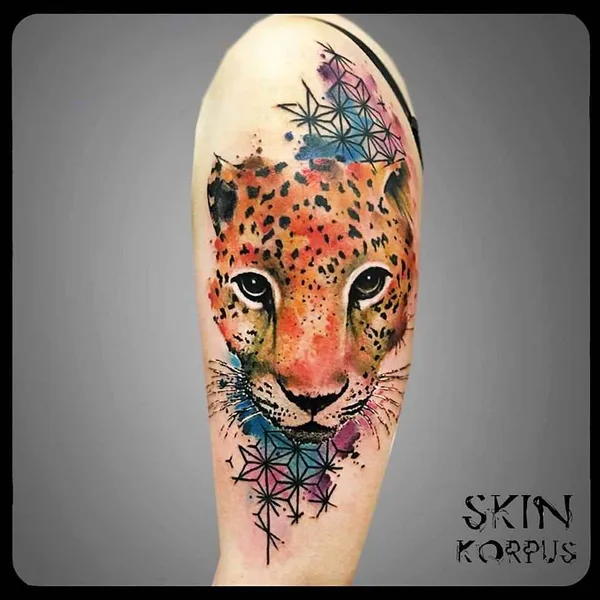 Watercolor tattoo by Skin Korpus in Luxembourg
