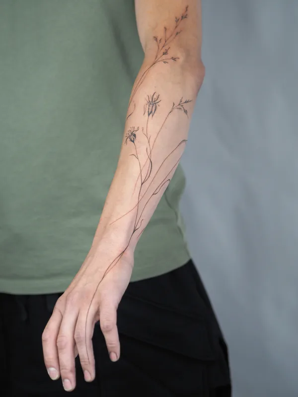 male black graphic tattoo auf forearm #84227 | Tätowierer Anna Novitskaya