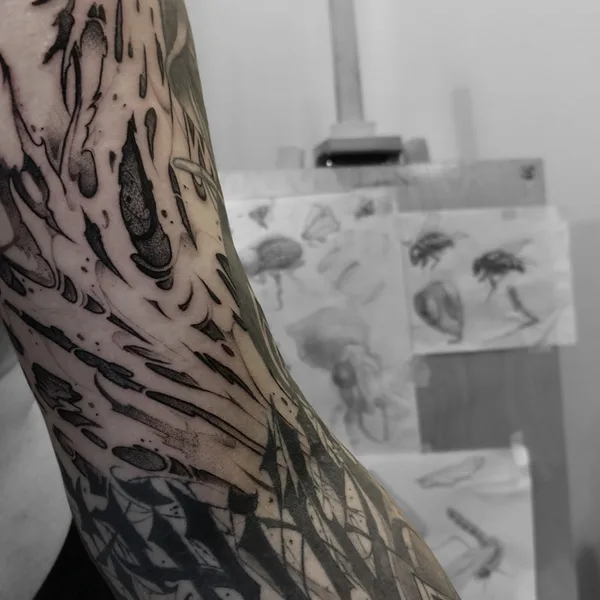 Lettering tattoo by Redz Roman in Shanghai