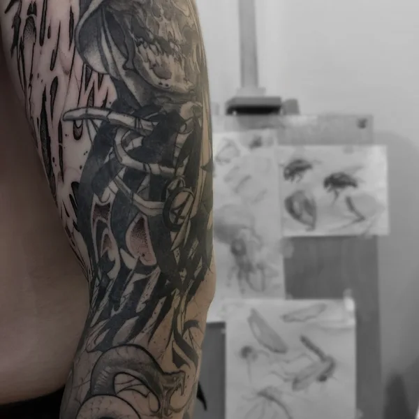 Lettering tattoo by Redz Roman in Shanghai