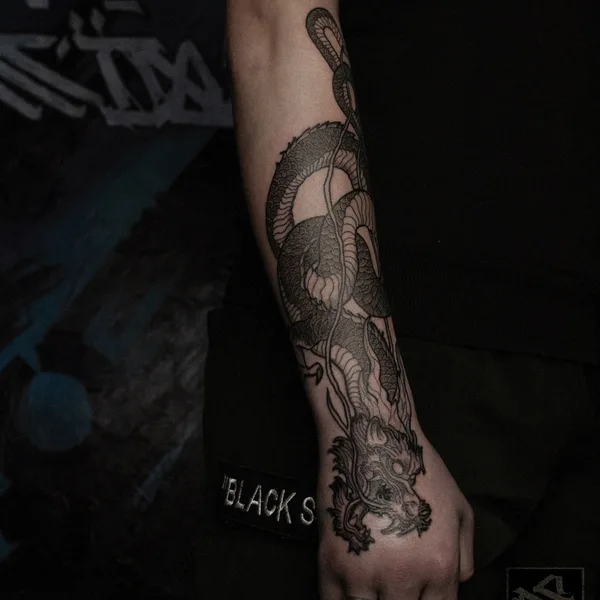 Graphic tattoo by Дмитрий Войтенко in Саратов