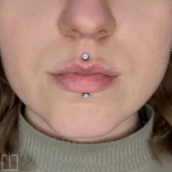 Feminine tattoo by Николай Гребенников in Калининград