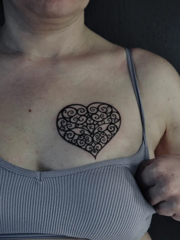 female black ornamental tattoo on chest #84831 | Tattoo Artist Павел Ященко