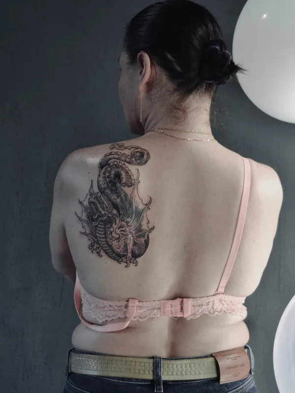 female black and grey blackwork tattoo on upper back #84836 | Tattoo Artist Павел Ященко