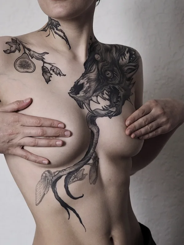 female black authorsstyle tattoo on breast #90157 | Tattoo Artist Женя Зимина