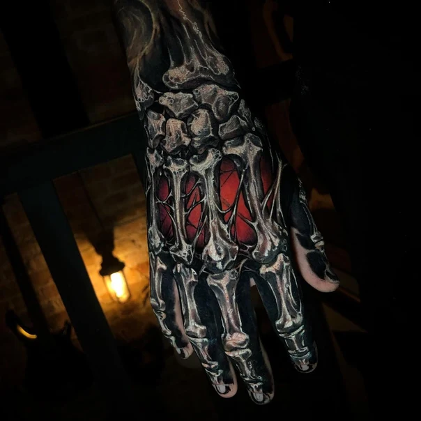Biomechanical Skeleton tattoo on Hand