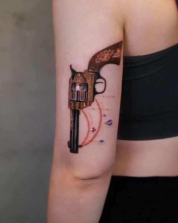 Realism Gun, Jewelry tattoo on Upper Arm